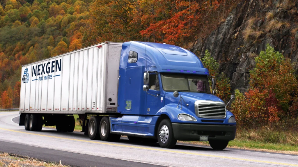 A long haul truck with NexGen Polymers logo